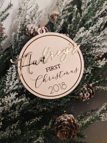 Custom Ornament for your baby's first Christmas. Made from both acrylic and engraved birch wood.