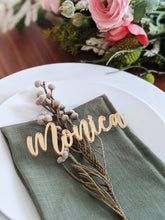 Load image into Gallery viewer, Gold acrylic custom name place card on dinner plate at a wedding party
