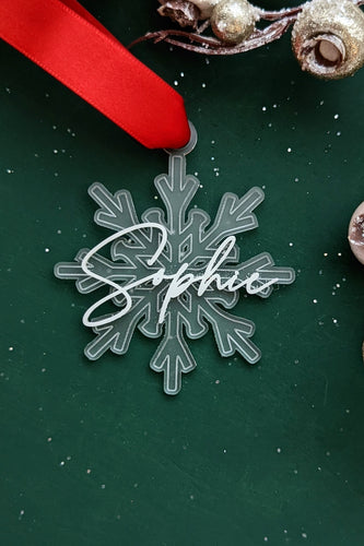Etched frosted acrylic snowflake ornament with custom name in a variety of colors